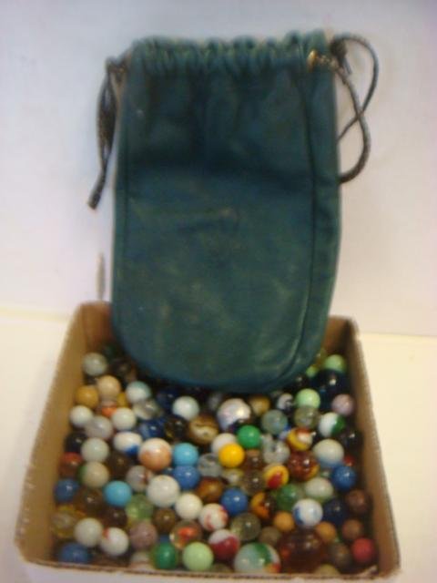Collection of Vintage & Contemporary Marbles & Bag:: Collection of Vintage & Contemporary Marbles & Bag: Including "Popeye" Red, Yellow and Clear Corkscrew, Benny's Clay's, etc., 1940-150's. Contemporary Mexican Iridescent and Pearlescent Marble, 1980-1
