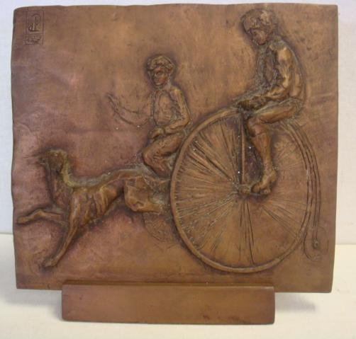 Plaster Plaque, Boys on Penny Farthing Bikes:: Plaster Plaque, Boys on Penny Farthing Bikes: Greyhound Leading the Two Boys. Work is in High Relief with Bronze Relief with Bronze Coat. Hanger on Felt Back and Stand. Foundry Mark dP on Top Left and