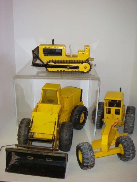 Vintage Steel Construction Vehicle Toys:: Vintage Steel Construction Vehicle Toys: Tonka Turbo-Diesel XMB 975, Tonka Traxxx Road Scraper and Unmarked Bulldozer. In Played With Condition. (50-100)