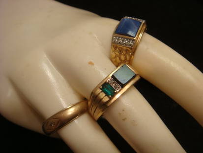 Three Men's 10KT Gold Rings:: Three Men's 10KT Gold Rings: Gold Band, Size 10, Small Bezel Set Diamond. Size 10 1/2 Blue Square Cut Stone w/Round Prong Set Diamonds and Nugget Embossed Shank. Size 10, Marked "Exquisite" w/Onyx &