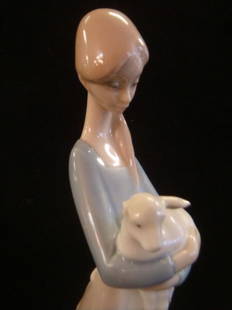 LLADRO Porcelain Figurine, "Girl with Lamb":: LLADRO Porcelain Figurine, "Girl with Lamb": Issued 1970, Retired in 2001. Sculpture by Fulgencio Garcia, 10 3/4"T, #4505. Made in Spain, Gloss Finish, From "Children" Collection. Blue Seal on