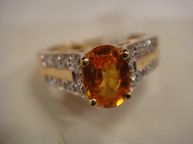 14KT Gold Spessatite Garnet and Diamond Ring: (1 of 3)