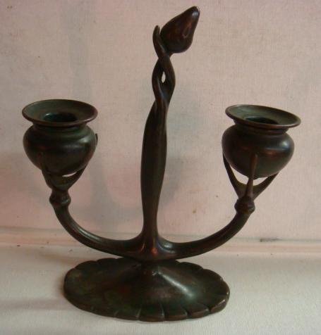 TIFFANY Studios NY Bronze Double Candle Holder:: TIFFANY Studios NY Bronze Double Candle Holder: Double Armed Candlestick Rests on Ribbed Oblong Foot. Rising from Center is an Art Nouveau Bud, Having Removable Candle Cups. Impressed Tiffany Studios 