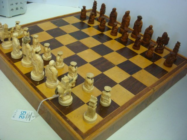 Korean Hand Carved Bone Chess Set:: Korean Hand Carved Bone Chess Set: Ca 1950-52. Owned by Chess Title Holder Jesse Greer. 32 Pieces, Fine Hand Carved Detailing with Playing Board Box. Pieces Range From 1 1/2" to 2 1/2". Black Stained