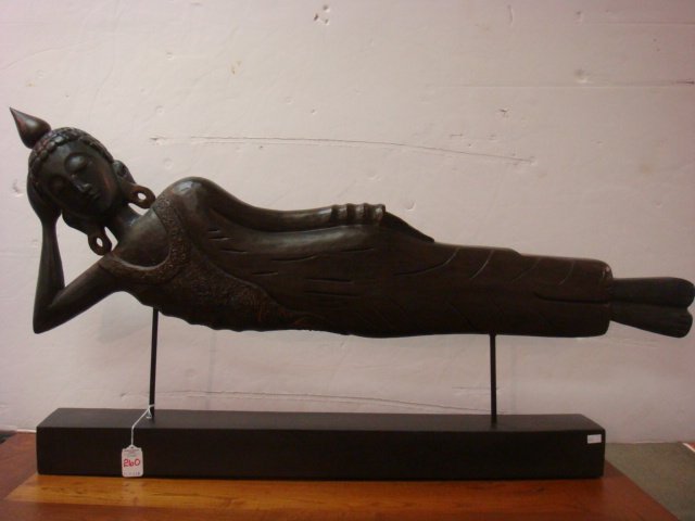 Carved Wood Thai Reclining Buddha:: Carved Wood Thai Reclining Buddha: Replica of Buddha at the Wat Pho Temple in Bangkok. He is Represented During His Last Illness About To Enter Par nirvana (Death of Body of Someone Who Attained Nirva
