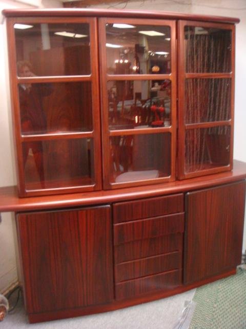 Mobican Rosewood Skovby Scandinavian China Cabinet:: Mobican Rosewood Skovby Scandinavian China Cabinet: Two Piece with Top Bowed Section with 3 Glazed Doors (2 with Crack). Individual Panes. Adjustable Glass Shelved Interior. Lower Section with 5 Stack