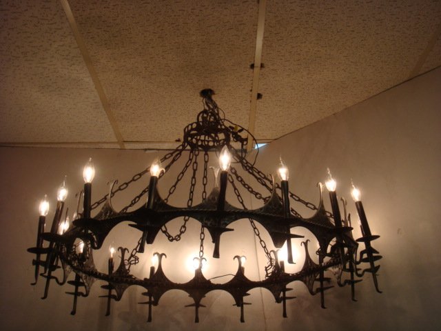 3 Monumental Gothic Wrought Iron Pendant Chandeliers:: 3 Monumental Gothic Wrought Iron Pendant Chandeliers: All Single Tier with Minimal Round Open Frame Supporting 18 Candle Lights with Visible Bulbs. Each Tube is Set Into Bobeche and Attached to Outsid