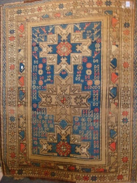Antique Persian Directional Geometric Prayer Rug:: Antique Persian Directional Geometric Prayer Rug: Low Nap, Four Banded Border, Loop Woven Stars, Geometric Pattern Surrounding Navy Center Field. Two Full and One Partial Medallion Running Down Center