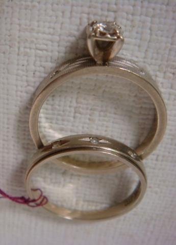 14KT White Gold Engagement/Wedding Set:: 14KT White Gold Engagement/Wedding Set: Engagement Ring Has Raised Prong Set Round Diamond on Incised Tapered Band, Marked "Garland". Wedding Band with Three Small Diamonds Marked 960 JTC. Both Size 6