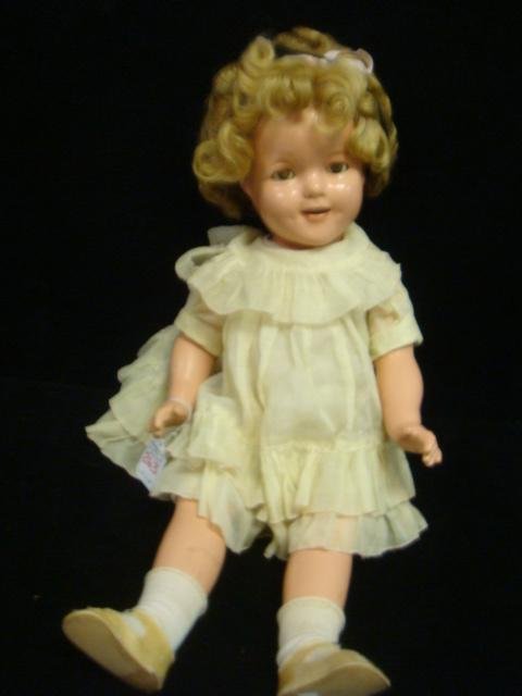Composition SHIRLEY TEMPLE Ideal Doll:: Composition SHIRLEY TEMPLE Ideal Doll: Marked Shirley Temple with Ideal in Diamond on Back. Blond Acrylic Wig, Sleep Eyes (Blown) with Painted Lashes and Brows, Open Mouth with 6 Teeth & 4 Jointed Bod