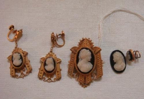 Deco Shell Cameo Pin, Earrings, Hair Pin and 1 Loose:: Deco Shell Cameo Pin, Earrings, Hair Pin and 1 Loose: Open Symmetrical Angles, Geometric Lines and Scrollwork Influence this Gold Frame Art Deco Jewelry. Cameos Set on Oval Onyx, Earrings are Screw Ba