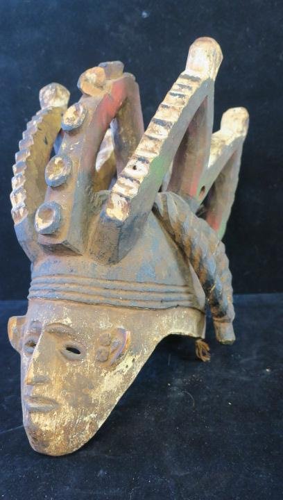 IGBO Tribe; Nigeria, Maiden Mask, Harvest Festival:: IGBO Tribe; Nigeria, Maiden Mask, Harvest Festival: The Idea Female Beauty form in the IGBO Tribe is Tall with Thin Face, Small Lips & Elaborate Three Crested Braided Hairstyle. Helmet Mask Used in Ha