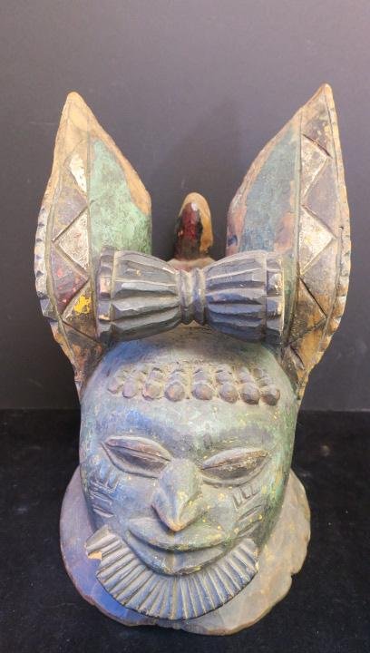African EGUNGUN Helmet Mask YOURBA Tribe, Nigeria:: African EGUNGUN Helmet Mask YOURBA Tribe, Nigeria: CA 1950's Helmet Mask with Triangle Shaped Rabbit Ears. Scar Tattooing and Beard. Unusual Nose with Wide Eyes and Vegetable Dye Coloration. 16"x11"x1