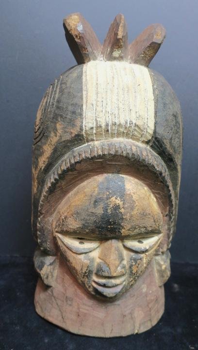 PUNU Tribe, Cameroon, Wedding Mask, CA 1900:: PUNU Tribe, Cameroon, Wedding Mask, CA 1900: Young Bride with Painted Face and Helmet Style Crown. Spiritual Symbols on Sides of Helmet. Spirit of an Ancestor Accented with Kaolin. 15"x 9"x 8". Africa