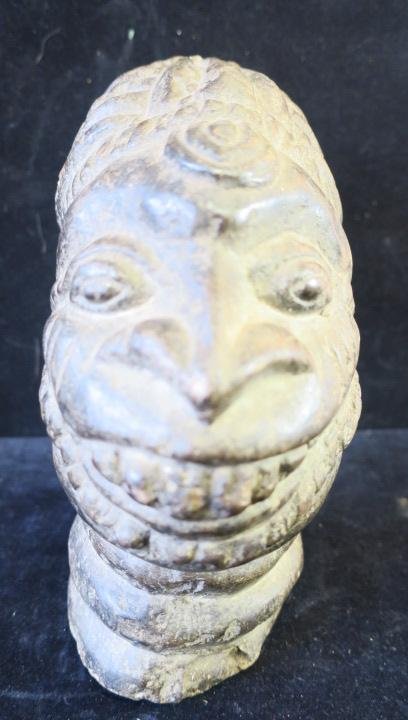 NOLOMI Tribe Ceremonial Head Stone Sculpture:: NOLOMI Tribe Ceremonial Head Stone Sculpture: Grinning Female Head with Elaborate Hairdo and Demon Like Appearance. 10 1/2" Tall and 8 1/2" Deep. 18 LBS. African Art Collection of Nick Beskenis. (-)