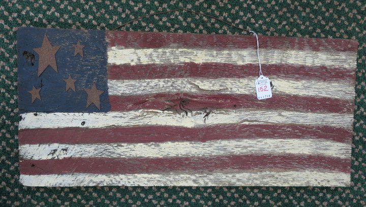 DONALD LEVINER, Folk Art American Flag on Board:: DONALD LEVINER, Folk Art American Flag on Board: Wooden Flag with 5 Stars and 10 Stripes. Hand painted Patriotic Piece Made from Distressed Salvaged Wood. 24 3/4" X 11". (100-200)