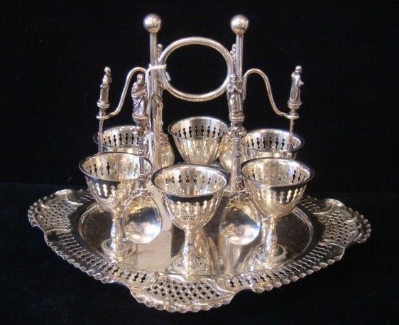 EPNS Egg Cup Holder & Six Sterling Apostle Spoons:: EPNS Egg Cup Holder & Six Sterling Apostle Spoons: Oval Pierced Tray is 10 1/2" with 6 Removable Pedestal Egg Cups. Center Handle with Holders for Six English Apostle Spoons with BM (Berthold Muller?)