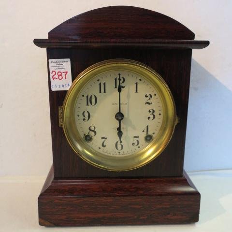 Seth Thomas Adamantine Shelf Clock:: Seth Thomas Adamantine Shelf Clock: Made in USA by Seth Thomas. Dome Top Clock with Adamantine, a Celluloid Veneer. CA 1902-1917. Some Veneer Missing on Corners. 11 1/4"T, 8 1/2" X 5 3/4". (100-200)