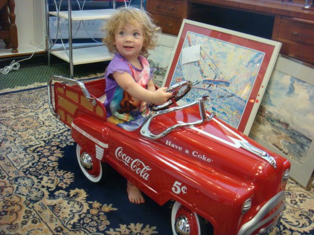 AMERICAN-RETRO Coca-Cola Pedal Car:: AMERICAN-RETRO Coca-Cola Pedal Car: New and Unused. Painted Red and White with Chrome Accents. Moveable Tailgate. 22"T X 43"L X 15"D (300-400)