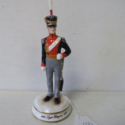 MICHAEL SUTTY "Trooper, 16th Light Dragoons, 1815:: MICHAEL SUTTY "Trooper, 16th Light Dragoons, 1815: Bone Porcelain Figurine of English Waterloo Cavalry Trooper. #83 in Limited Edition of 250. Hand painted. 7 1/2" T. No Chips, Cracks or Breaks. (150-