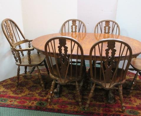 Oak Seven Piece Double Pedestal Table and Chairs:: Oak Seven Piece Double Pedestal Table and Chairs: 48" Oval Oak Table with Paw Feet and Two 18" Leaves. Four Windsor Chairs with Brace Backs and Two Armchairs Having Hoop Backs. (600-800)