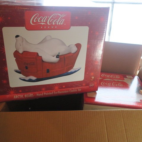 Two Coca-Cola Brand Nostalgic Cookie Jars:: Two Coca-Cola Brand Nostalgic Cookie Jars: Hand-painted Polar Bears and 8" Lunch Box Cookie Jars. Both New in Box, Unopened. (100-200)