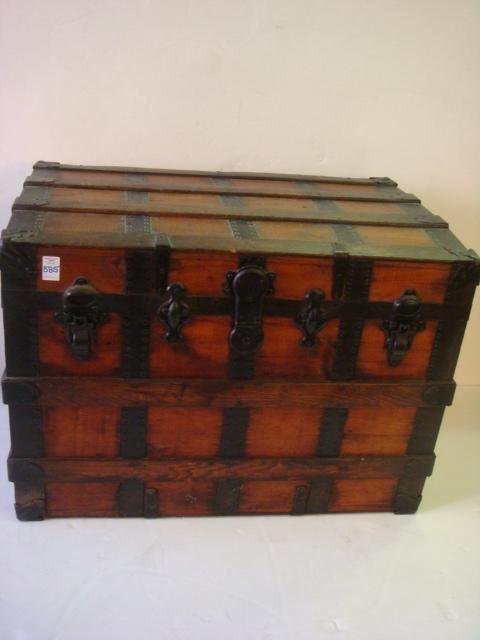 Oak Banded Oak Trunk:: Oak Banded Oak Trunk: Riveted metal Bands with Cross Oak Bands, Lift out Double Till. Floral Cloth Lined. Leather Side Straps intact. Meal Latches and Corner Pieces. (150-300)