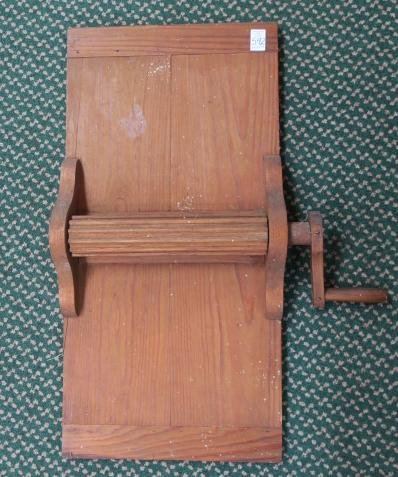 Early 20th Primitive Beaten Biscuit Board:: Early 20th Primitive Beaten Biscuit Board: Pine Board with Grooved Medial Rolling Pin, Hand Crank. Wired for Hanging. 30"T C 15"W X 4"D. (100-200)