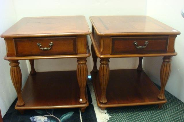Pair of Modern Side/End Tables with Matched Veneer:: Pair of Modern Side/End Tables with Matched Veneer: Banded and Blocked Top with Rounded Corners, Each with Single Drawer. Top Case Rests on Fluted Shaped Legs, Connecting to Lower Shelf. Pegged Feet. 