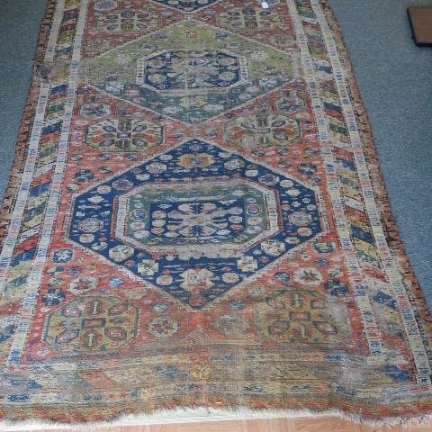 Hand loomed Antique Kazak Rug with Wear: (1 of 5)