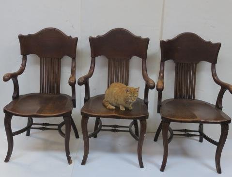 Three Oak Arm Chairs with Curved Back Splats:: Three Oak Arm Chairs with Curved Back Splats: Wide Curved Shaped Crest Rail with 9 Squared Slats form Back Splat. Arms Rounded and Curving. Shaped Seat. Stretcher with "C" Shape Sides, Turned Double S