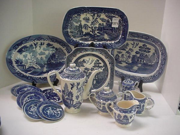 Blue Willow Collection Including Child Tea Set:: 1371. Blue Willow Collection Including Child's Tea Set: Includes 4 PC Child's Tea Set, 7"T Teapot, Sugar, 2 Creamers, Assorted Platters, Bowl, Butter Pats, Plates and Saucers. Most Marked Made in Japa