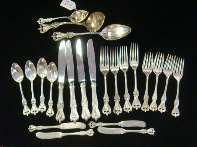 TOWLE "Old Colonial" Sterling Silver Flatware:: TOWLE "Old Colonial" Sterling Silver Flatware: Service for 4 with Extras. CA. 1895-2009. Four Each of Luncheon and Salad Forks, Hollow Handle Knives with Stainless Blades, Teaspoons and Flat Butter Sp