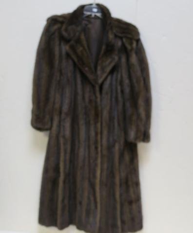 Ladies Full Length Mahogany Mink Coat: Ladies Full Length Mahogany Mink Coat This Classic Double Breasted Look With Shoulder Epaulets is Fully Lined. Velvet Lined Slit Pocket and Secret Interior Pocket. Side Slits with Button Closure. Vert