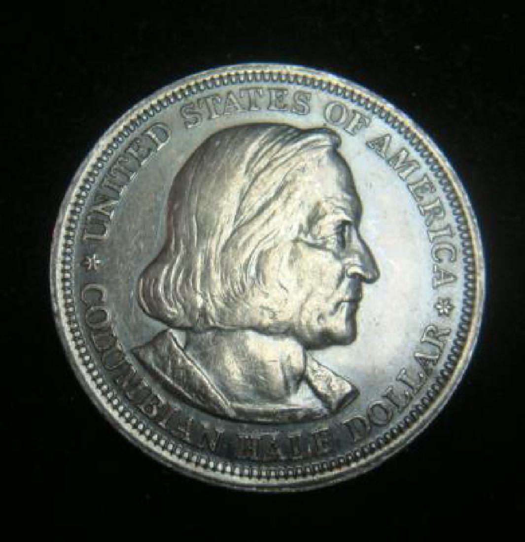 1893 COLUMBIAN EXPOSITION Commemorative Coin MS60:: 1893 COLUMBIAN EXPOSITION Commemorative Coin MS60: Coin Features Columbus on Obverse and Santa Maria Galleon and World Map on Reverse. Coin has some Toning. (50-100)