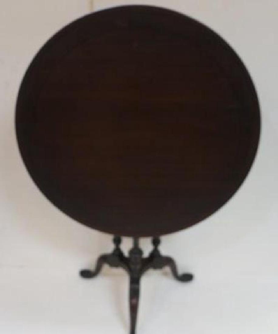 KITTINGER Mahogany Tea Table with Tilt Top:: KITTINGER Mahogany Tea Table with Tilt Top: Dish Top with Ebony Line Inlay Around Top. Three Turned legs on Triangular Platform. Three Cabriole Legs End in Spoon Feet. Metal Tag on Bottom "Kittinger,