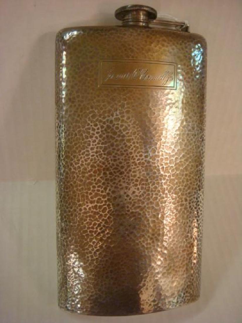 WEBSTER CO. Sterling Silver Hand Hammered Flask:: WEBSTER CO. Sterling Silver Hand Hammered Flask: Tall Curved Hammered Flask is 8 1/4"T. Screw Off Hinged Lid. Engraved James O'Connell JR. (100-200)