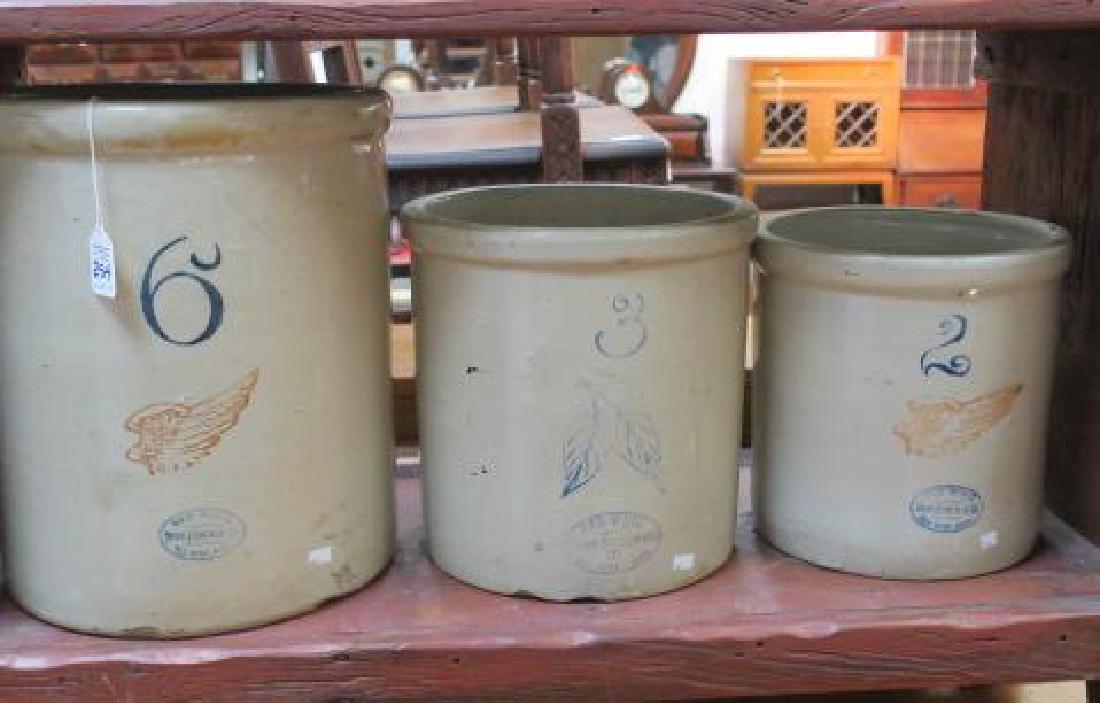 Three Vintage RED WING Stoneware Crocks:: Three Vintage RED WING Stoneware Crocks: All with Oval Red Wing Union Stoneware Co, Red Wing, Minn. Stamp. Date from 1892-1936. Six Gallon and Two Gallon Crocks have Red Wing Stamp. 15" and 10"T. 11"T
