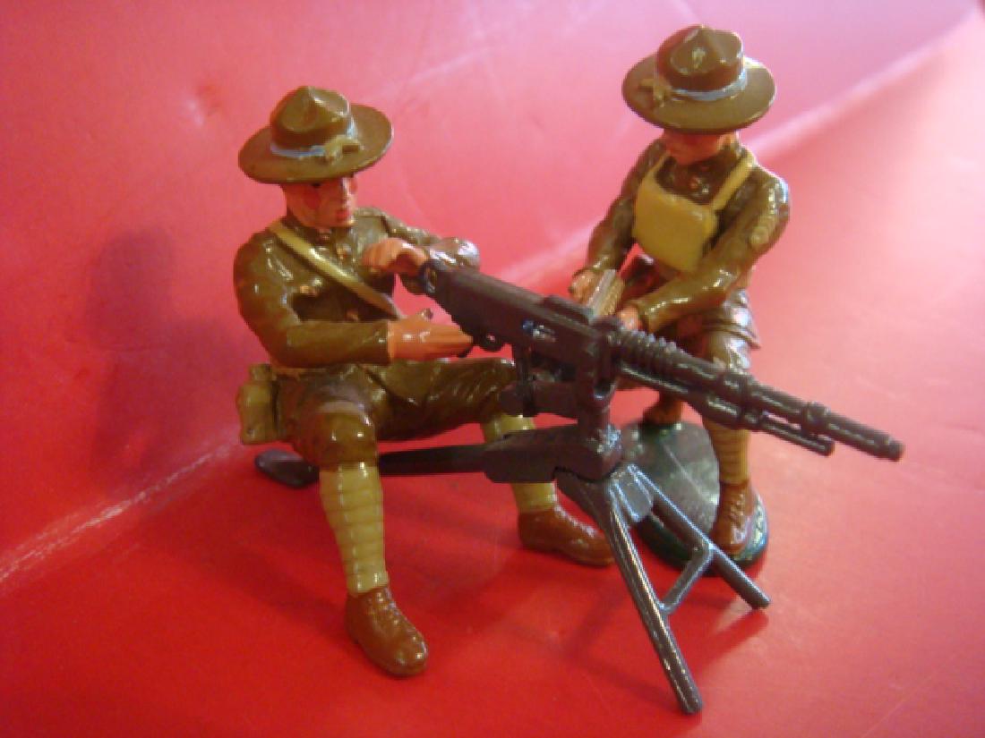 W. BRITAIN, 54mm, 3 Piece Hotchkiss Machine Gun Crew:: W. BRITAIN, 54mm, 3 Piece Hotchkiss Machine Gun Crew: Hand painted Model Soldiers from Britain's PREMIER SERIES. Created by Charles Biggs, Master Modeller. New in Box with Description and Certificate 