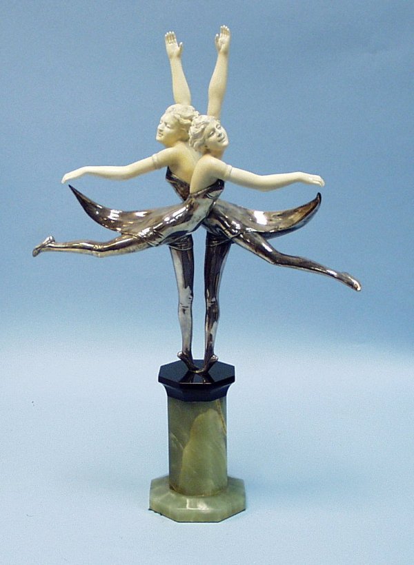 Cast after JOHANN PHILLIP FERDINAND PREISS (1882-19: Cast after JOHANN PHILLIP FERDINAND PREISS (1882-1943) German school. "Butterfly Dancers." A silver patinated bronze and carved ivory figural group. Signed on bronze and on black and green onyx pedest