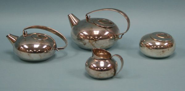ART DECO - A very good silverplated 4 piece tea se: ART DECO - A very good silverplated 4 piece tea set by Gallia and excecuted by Christofle in 1925. Each piece is fully marked on the base.