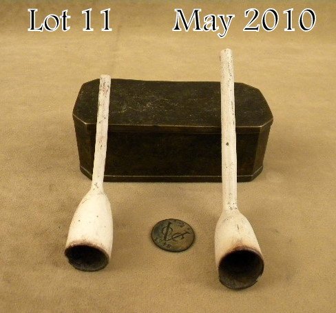 Early American Revolutionary War era grouping incl: Early American Revolutionary War era grouping including a Dutch brass tobacco tin approx. 4" x 2" x 1-1/2" with a hinged lid and dark patina; two old clay pipes, a hand written ledger (approx. 3-1/2" 