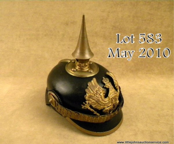 Imperial German Prussian Infantry NCO's Pickelhau: Imperial German Prussian Infantry NCO's Pickelhaube complete with Prussian Eagle front plate, chin scales, cockades, detachable spike & leather liner. Very good condition. Est. $600-1,000