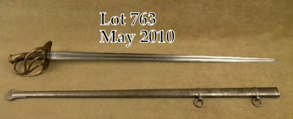 French Heavy Dragoon sword and metal scabbard, ap: French Heavy Dragoon sword and metal scabbard, approx. 46" overall and approx. 39-1/2" fluted blade marked on the top rib of the sword at the hilt "Manuf re R w Ju Klingenthal x bre 1814". This very c