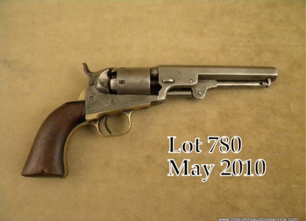Colt Model 1849 pocket percussion revolver, .31 c: Colt Model 1849 pocket percussion revolver, .31 cal., 5" octagon barrel, blue and case hardened finish, wood grips, #53079. This gun is in overall good condition showing an old light cleaning to metal
