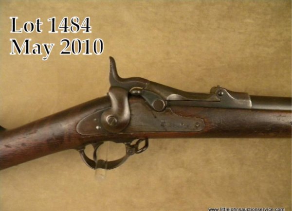 Springfield Model 1873 Trapdoor military rifle, : Springfield Model 1873 Trapdoor military rifle, 45-70 cal., 32" round barrel, blue finish, sling swivels, iron ramrod, wood stock, #32361. This gun is in overall good condition showing a plum brown pa