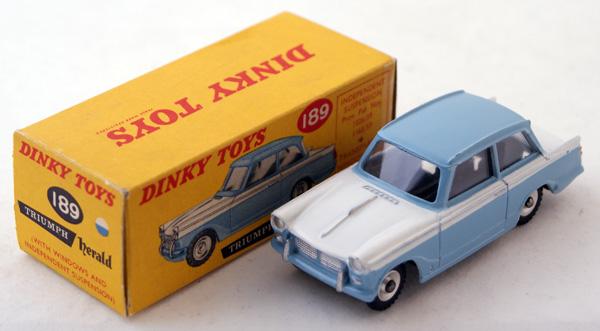 Dinky # 189 Triumph Herald. Light Blue roof and s: Dinky # 189 Triumph Herald. Light Blue roof and sides with White centre and spun hubs. Mint in Near Mint correct colour spot box.