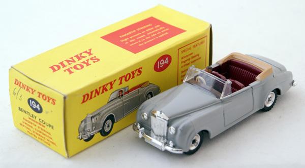Dinky # 194 Bentley Coupe. Pale Grey with Dark Re: Dinky # 194 Bentley Coupe. Pale Grey with Dark Red seats, Tan Tonneau, Grey driver and spun hubs. Mint in Excellent box.