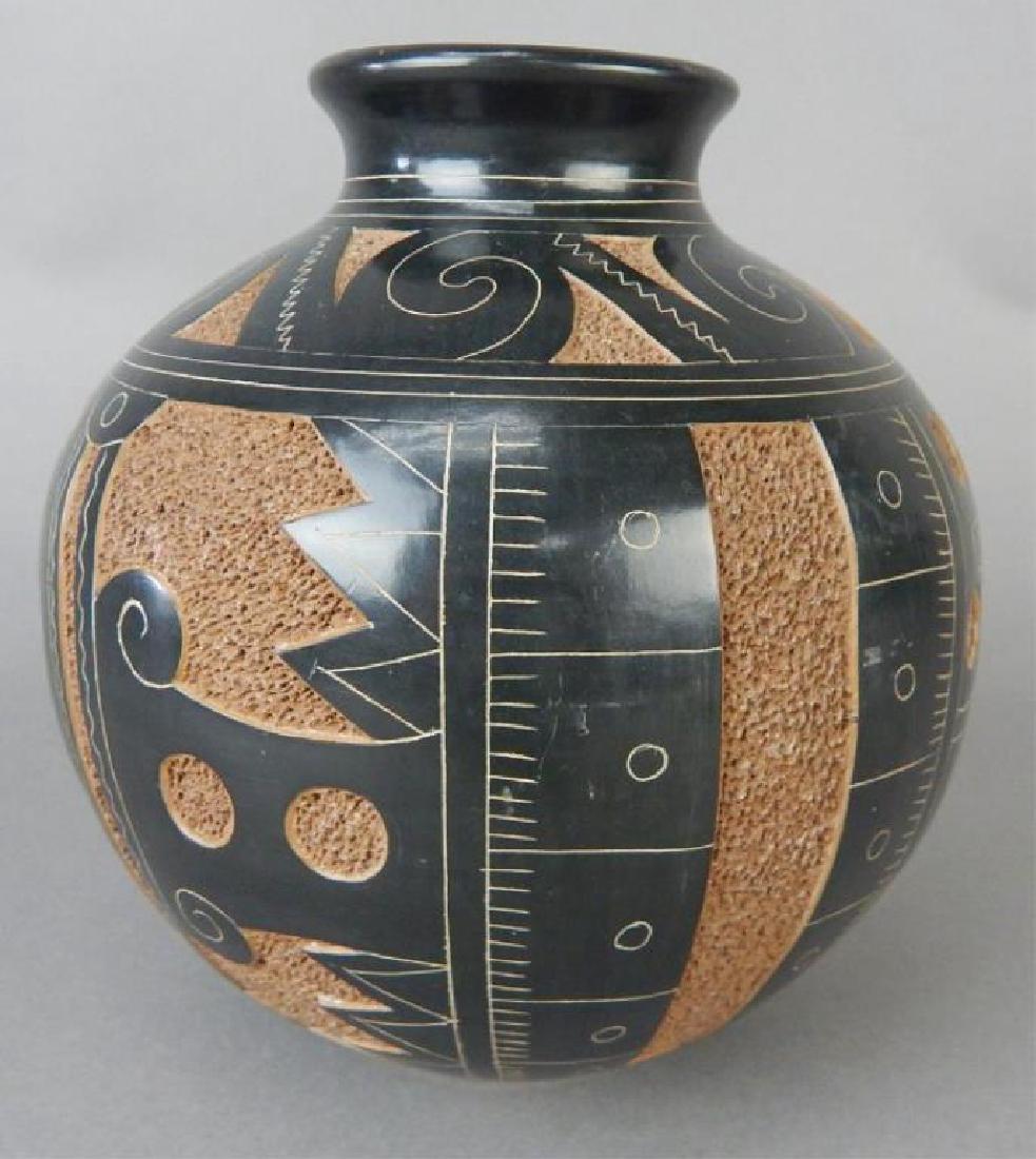 Nicaraguan Art Pottery Vase: Signed Roger Calero. Measures 6" x 6". Estimate $100 - $200. Starting bid $20.