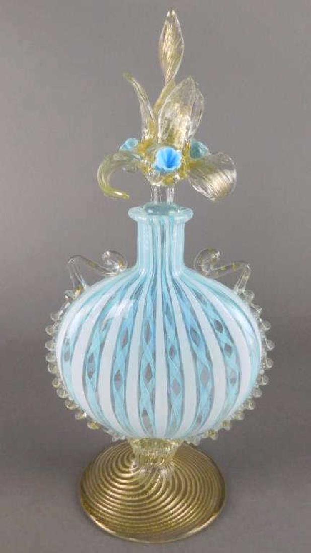 Blue Venetian Glass Perfume Bottle: Measures 11". Estimate $200 - $400. Starting bid $20.
